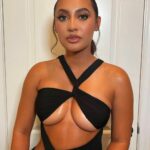 Francia Raisa Shows Her Sexy Boobs in a Black Dress (6 Photos)