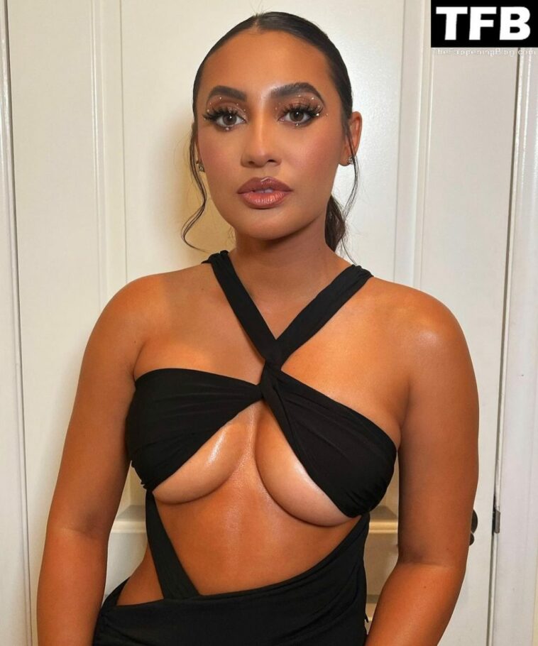 Francia Raisa Shows Her Sexy Boobs in a Black Dress (6 Photos)