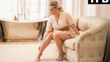 Hilary Duff Shows Off Her Shapely Legs and Dazzles in Festive Tinsel Smash + Tess Romper (12 Photos)