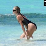 Khloe Kardashian Show Off Her Incredible Figure in a Black Bikini While in Turks and Caicos (11 Photos)