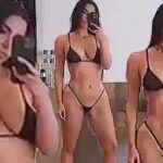 Kim Kardashian Shows Off Her Curves in a Micro Bikini (7 Pics + Video)