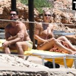 Michelle Hunziker & Giovanni Angiolini Relax on the Beach of Their Hotel in Sardinia (16 Photos)