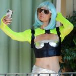 Paris Hilton Poses in a Silver Bikini on Hotel Room’s Balcony in Portofino (34 Photos)