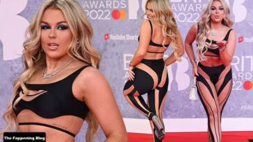 Tallia Storm Flaunts Her Sexy Figure in a Risqué Black Top and Cutout Trousers at The BRIT Awards (18 Photos)