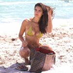 Tao Wickrath Tans in the Sunshine on Miami Beach (25 Photos)