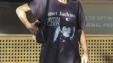 Rita Ora is Spotted Wearing a Vintage Janet Jackson ‘Rhythm Nation 1990’ Tour T-shirt on an Outing in Sydney (20 Photos