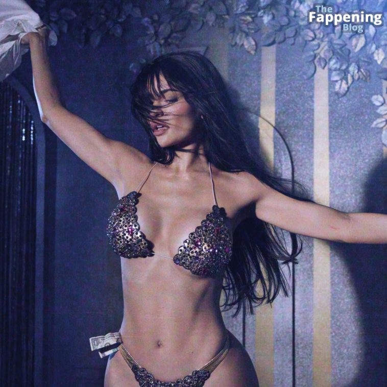 Kylie Jenner Poses in a Bikini for Halloween (4 Photos)